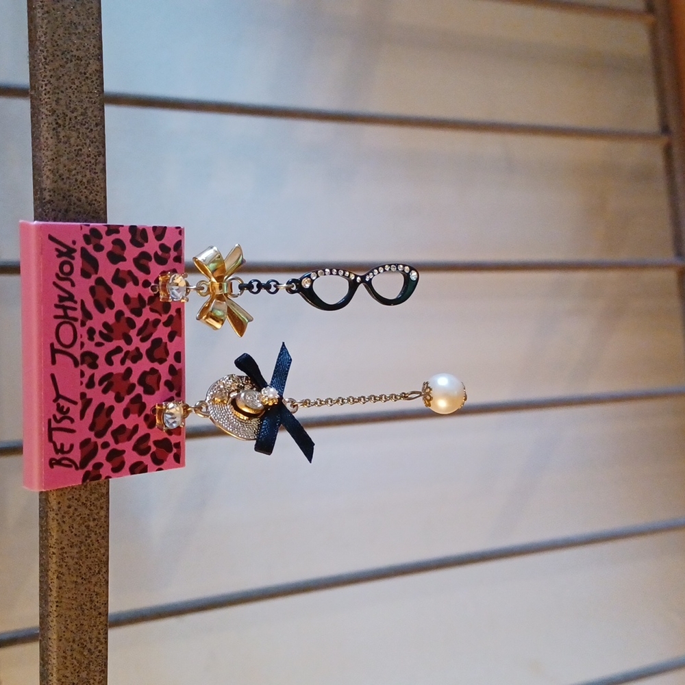 Betsey Johnson's dangling earrings